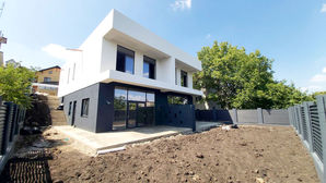 Telecentru Doreşti o casă de tip duplex in stil Hi-tech te...